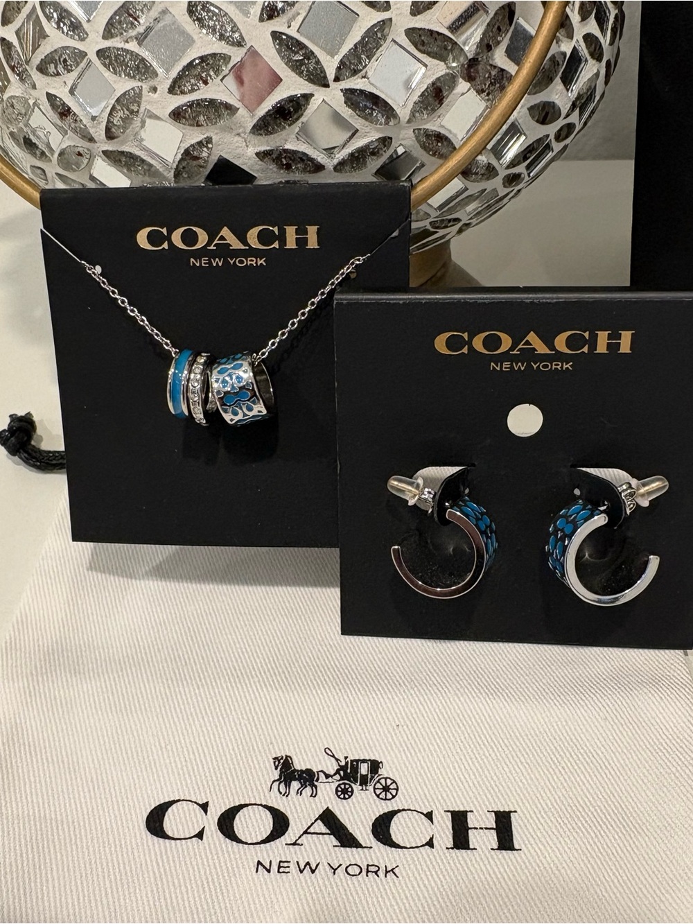 COACH Silver-Tone Hoop Earrings with Blue Enamel Accents